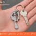 Keyzmo 16-in-1 multi-tool key size comparison with standard house key