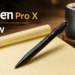 SpyPen Pro X resting on a notebook for covert recording.