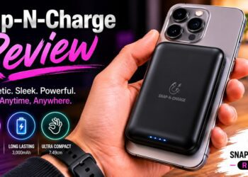 User holding an iPhone with the compact Statik Snap-N-Charge magnetic power bank attached.