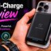 User holding an iPhone with the compact Statik Snap-N-Charge magnetic power bank attached.