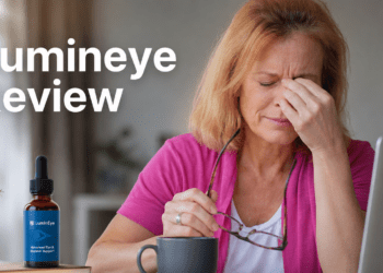Office worker experiencing digital eye strain before using Lumineye drops.